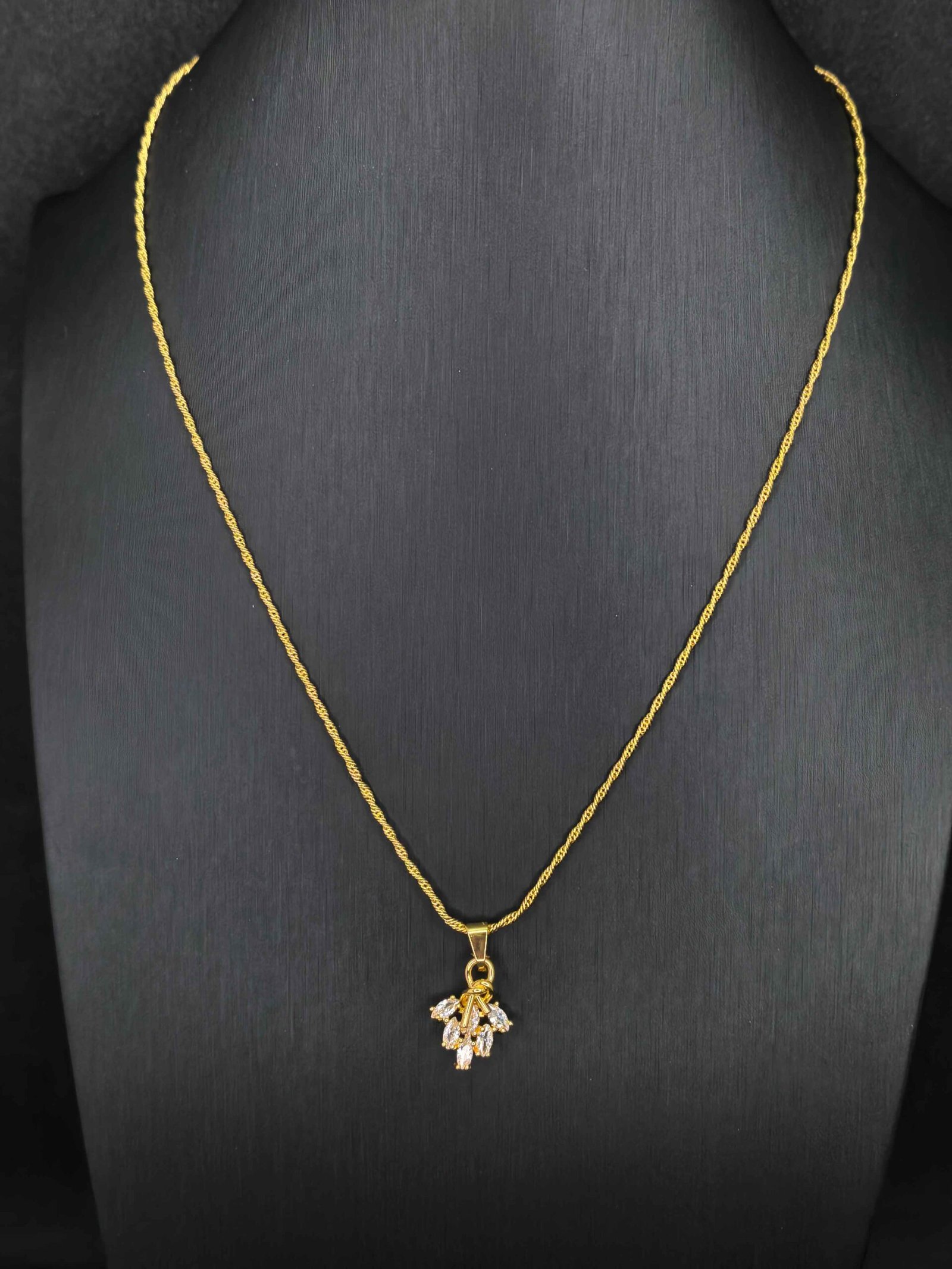 Gold-toned mini flower pendant necklace with a dancing chain-মহিলাদের গোল্ড-টোন মিনি ফ্লাওয়ার পেনড্যান্ট নেকলেস, পার্টি ও বিয়েতে স্টাইলের জন্য