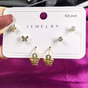 A premium collection of gold plated 3 set earrings combo including studs and elegant drops