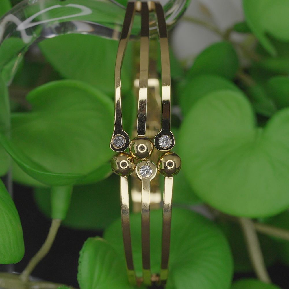 Gold pated bracelet stainless steel with golden ball and stone – মহিলাদের জন্য গর্জিয়াস গোল্ডেন বল ও স্টোন স্টাডেড ব্রেসলেট - Image 2