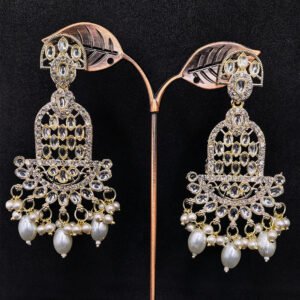 Kundan earrings with white stone and pearl drops for women.
