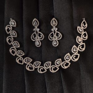 Silver toned 3 pieces zirconia necklace set for women with elegant cubic zirconia stones.
