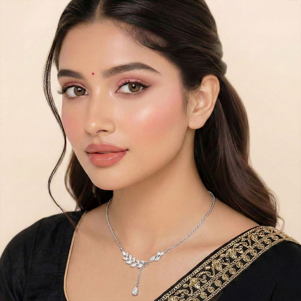 Silver-toned necklace featuring a leaf or wheat-shaped pendant embellished with sparkling stones – মহিলাদের জন্য ঝিলমিল পাথরে মোড়ানো স্টাইলিশ ফ্যাশন নেকলেস - Image 2