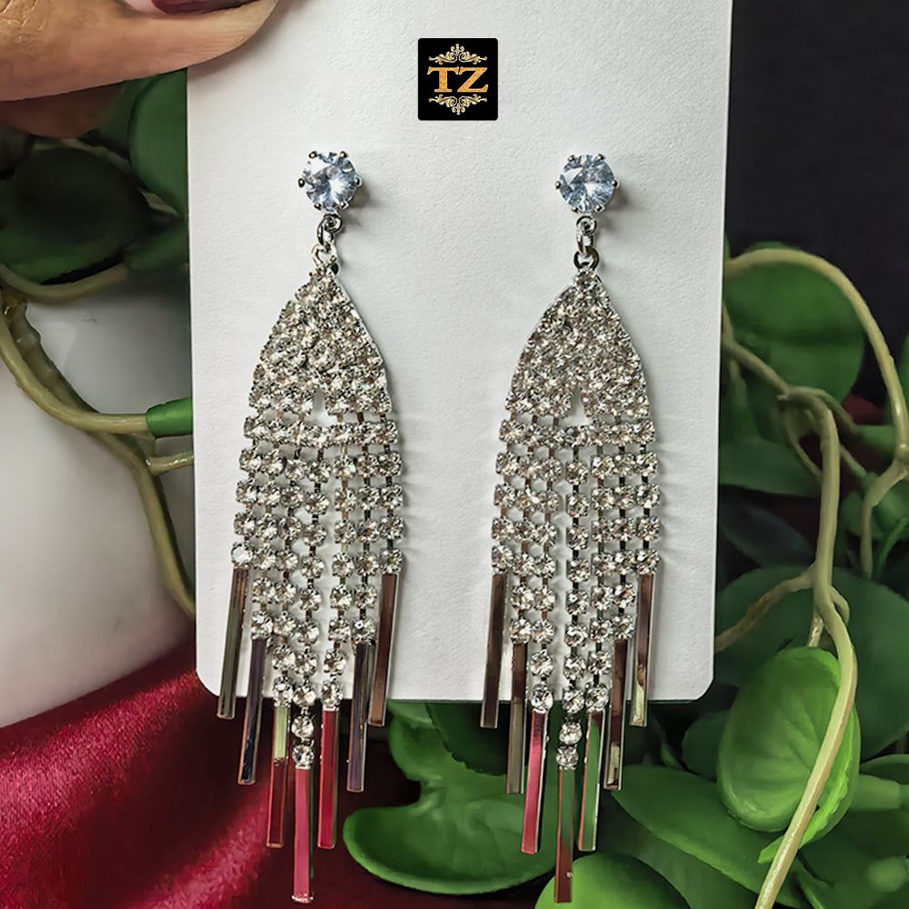 Silver-plated crystal long dangler earrings for women featuring sparkling crystal accents and an elegant elongated design.