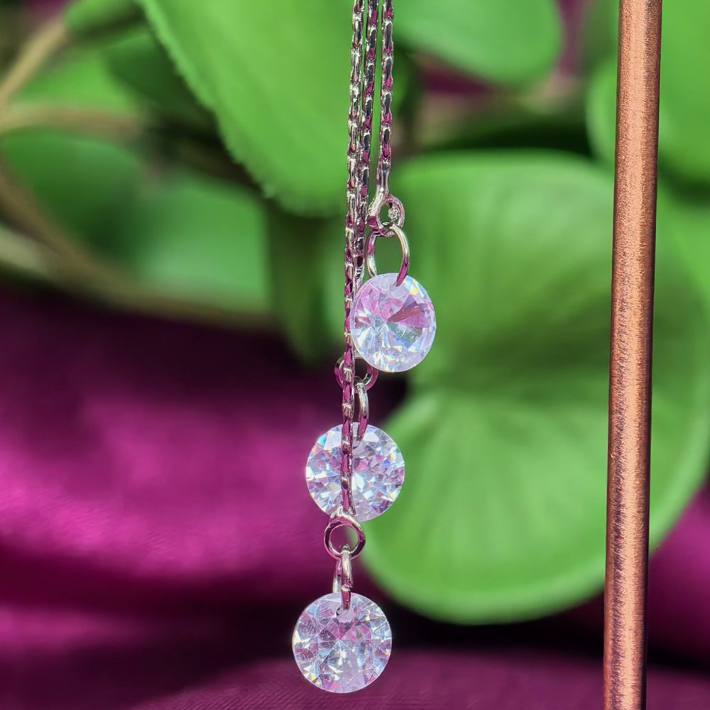 Silver and Gold-Plated Geometric Rhombus Drop Earrings with Rhinestone and Tassel Details মহিলাদের জন্য রাজকীয় জিওমেট্রিক রম্বস ড্রপ ইয়াররিং কালেকশন - Image 4