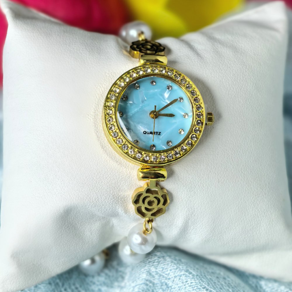Women's gold-tone quartz bracelet flower design with pearl – মহিলাদের জন্য রাজকীয় ব্রেসলেট ঘড়ি ও ফ্লোরাল ওয়াচ কালেকশন - Image 2