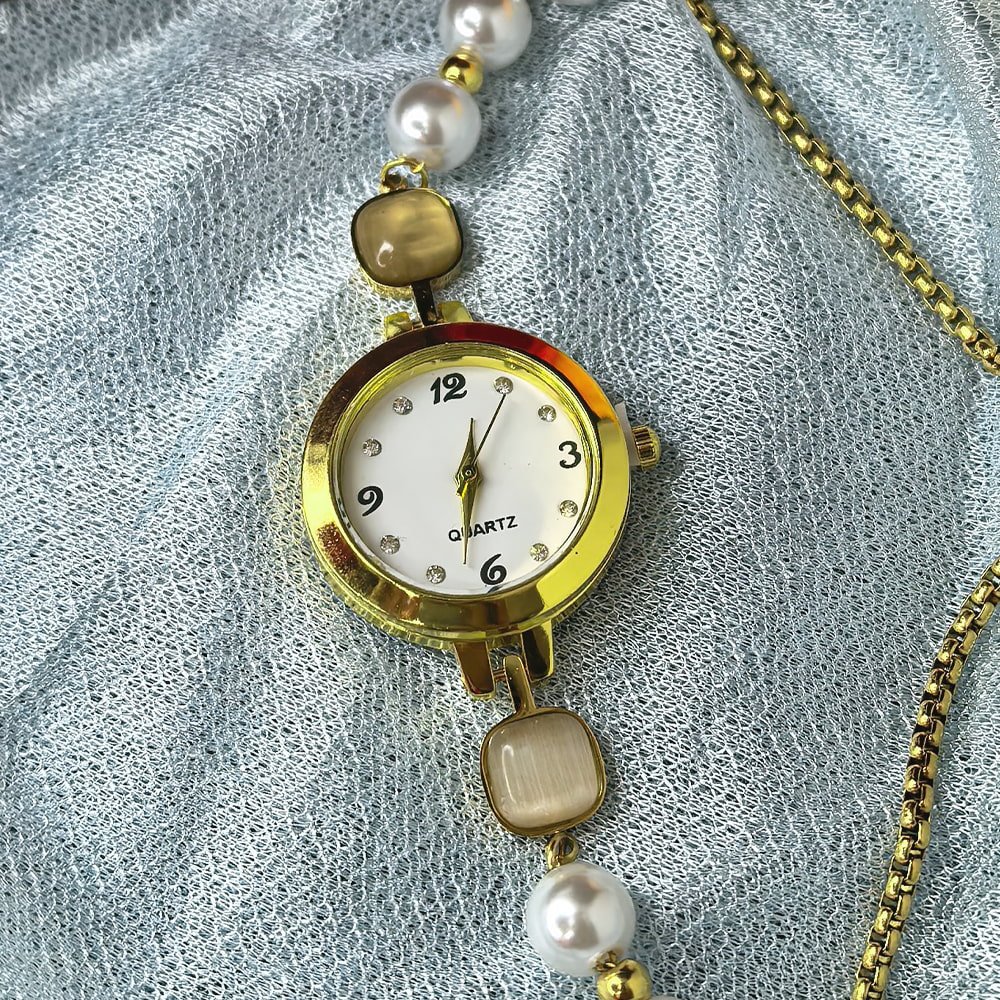 Women's gold toned quartz bracelet floral design with white pearl – মহিলাদের জন্য রাজকীয় ব্রেসলেট ঘড়ি ও আভিজাত্যপূর্ণ ফ্যাশন ওয়াচ - Image 3
