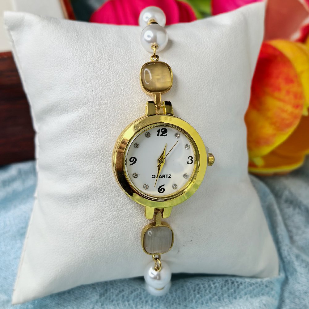 Women's gold toned quartz bracelet floral design with white pearl – মহিলাদের জন্য রাজকীয় ব্রেসলেট ঘড়ি ও আভিজাত্যপূর্ণ ফ্যাশন ওয়াচ - Image 4