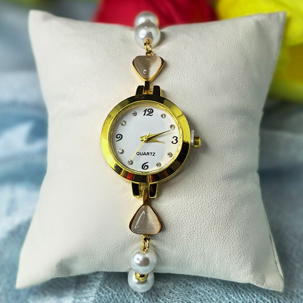 Women's gold toned quartz bracelet with pearl – মহিলাদের জন্য রাজকীয় ব্রেসলেট ঘড়ি ও পার্ল ওয়াচ কালেকশন - Image 2
