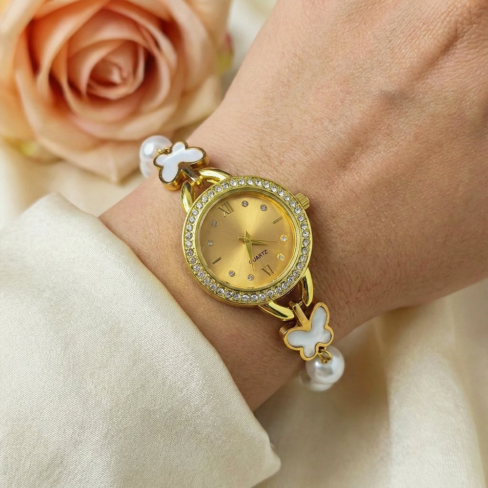 Women’s gold toned quartz bracelet butterfly design with white pearl – মহিলাদের জন্য রাজকীয় ব্রেসলেট ঘড়ি ও বাটারফ্লাই ওয়াচ কালেকশন