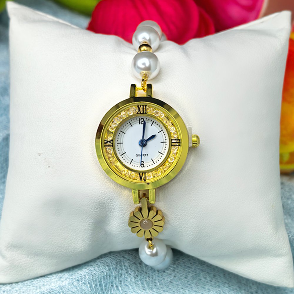 Women's gold toned quartz bracelet floral design with pearl – মহিলাদের জন্য রাজকীয় ব্রেসলেট ঘড়ি ও ফ্লোরাল ওয়াচ কালেকশন - Image 2