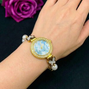 Women's Gold Toned Quartz Bracelet Floral Design with White Pearl
