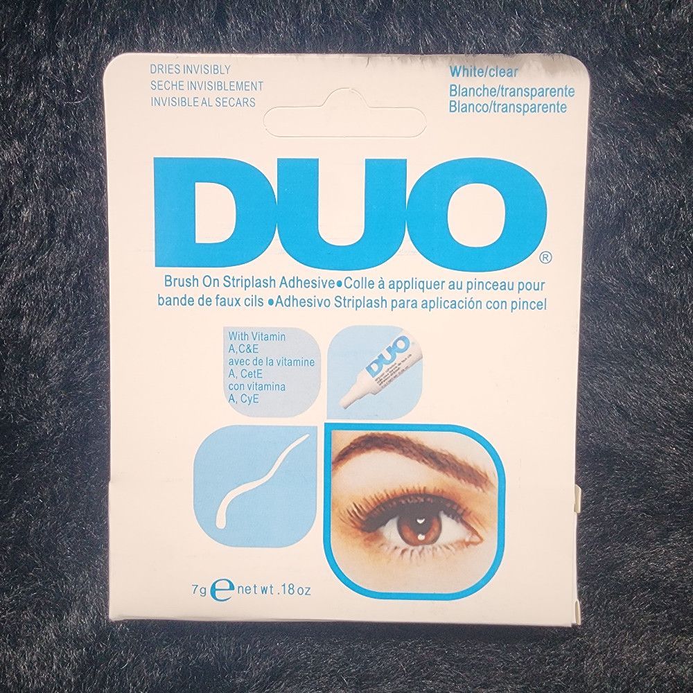 DUO Brush On Striplash Adhesive White and Blue Packaging