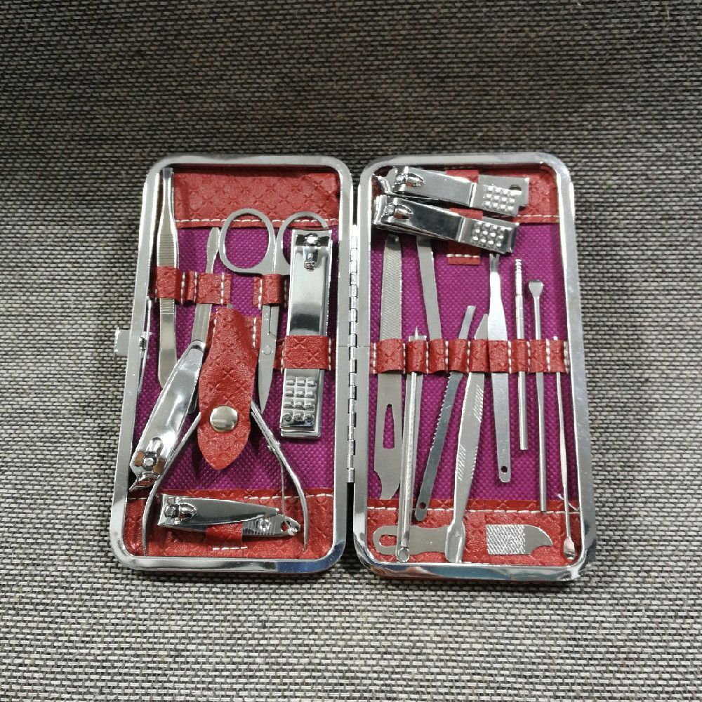 Silver Metal Manicure Set with Purple and Red Textured Tools