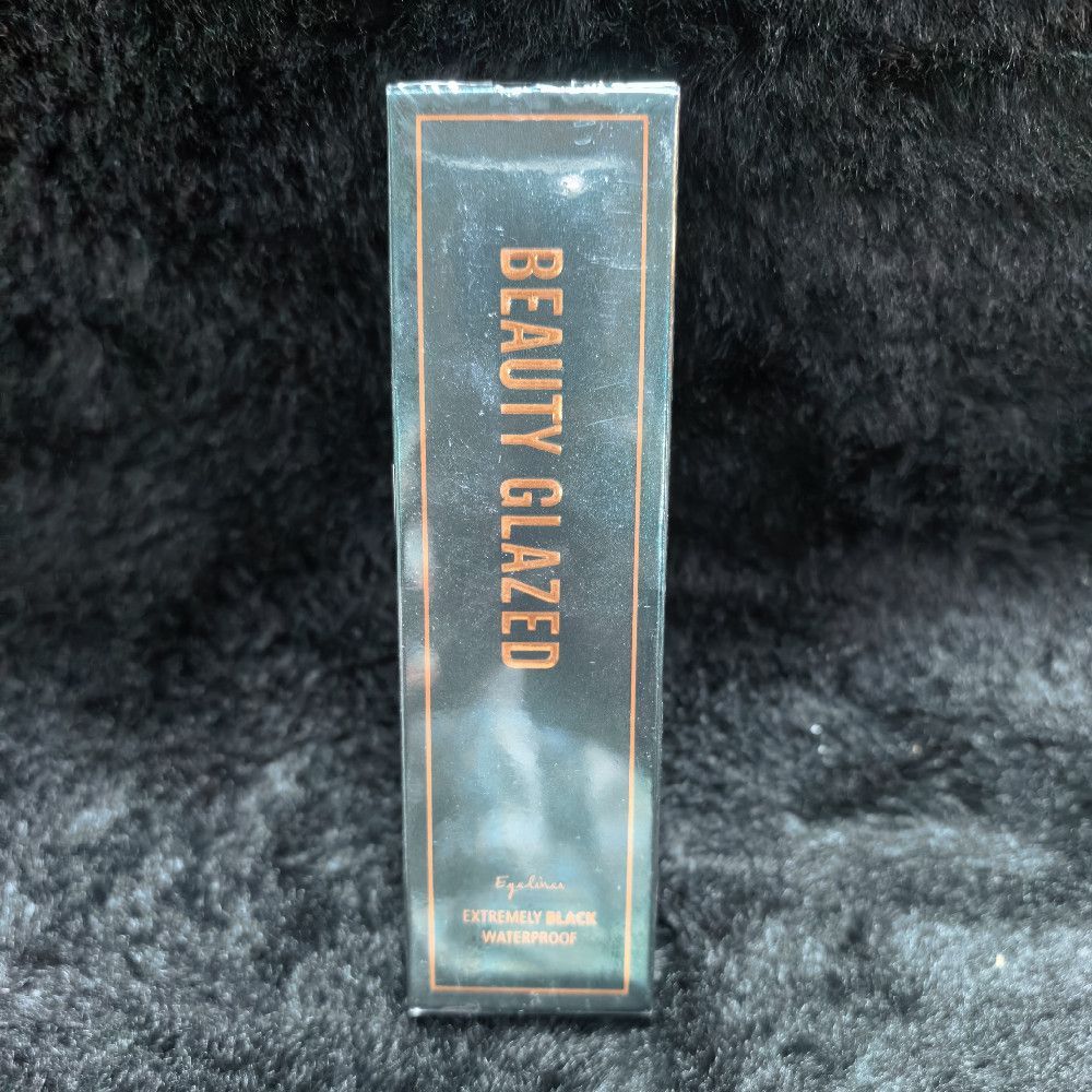 Black and Orange Waterproof Eyeliner in Paper Cardboard Box Packaging