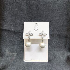 Elegant Pearl Drop Earrings with Silver Flower Cluster Design
