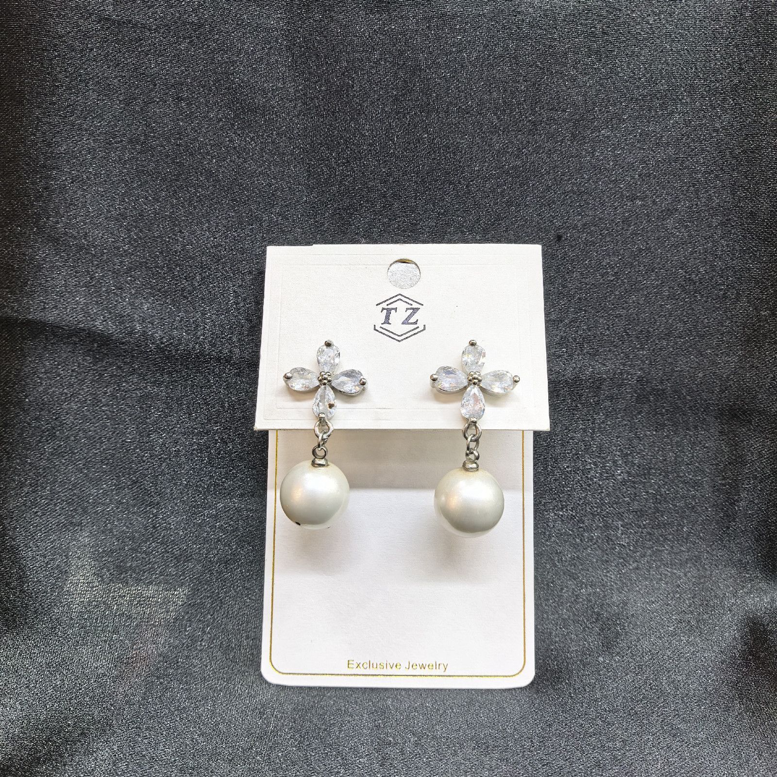 Elegant Pearl Drop Earrings with Silver Flower Cluster Design