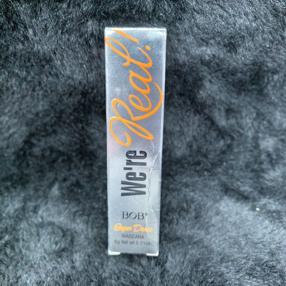 Super Dense Mascara 6g Cardboard Pack Silver Orange Black We're Real