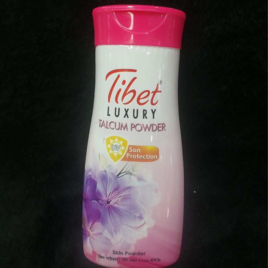 Tibet Luxury Talcum Powder with Pink, White, Purple, Yellow Floral Design in Plastic Jar provides Sun Protection and Soft Skin Finish daily